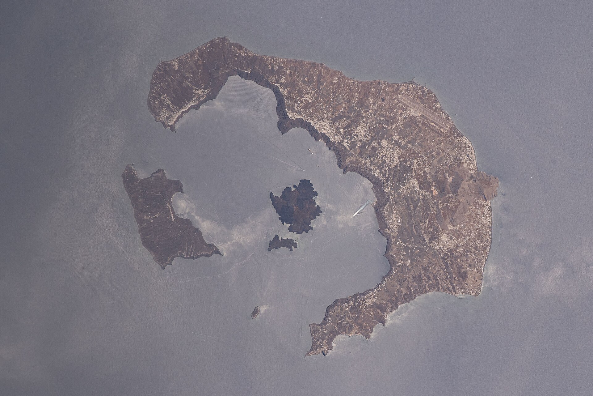 Cropped photo of the Santorini caldera, taken June 25, 2022 during Expedition 67 of the International Space Station.