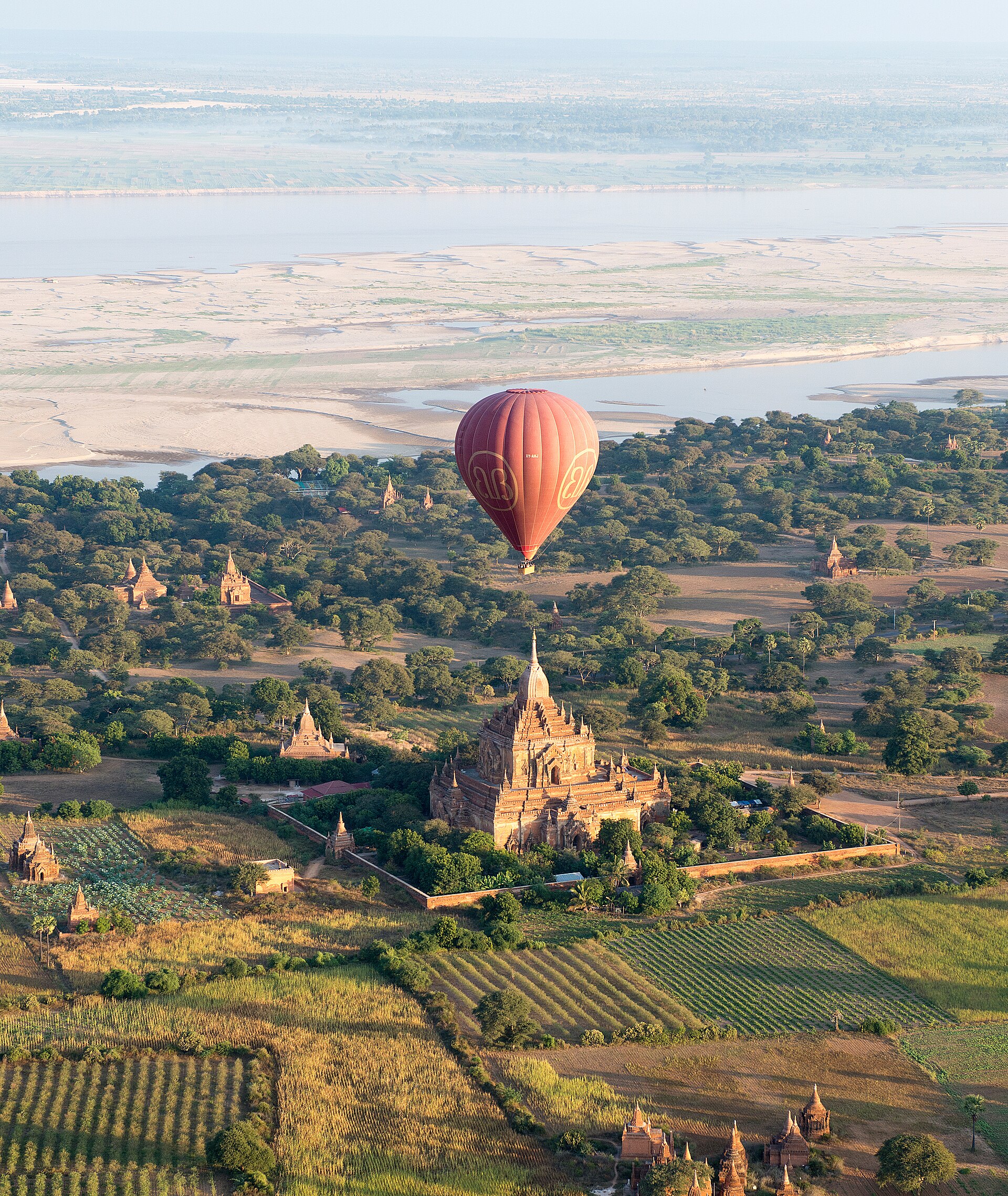 Hot air balloon over a pagoda in Bagan