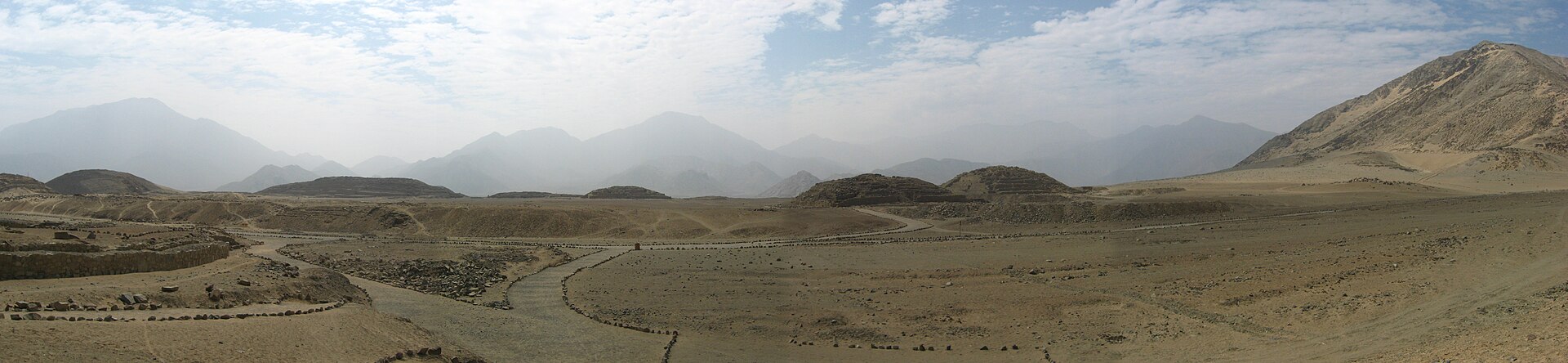 Wide view of the ruins at Caral, the most excavated ruins of the oldest known civilization in the Americas, the Norte Chico civilization. The Norte Chico Civilization is believed to have started around 3500 BC on the coa