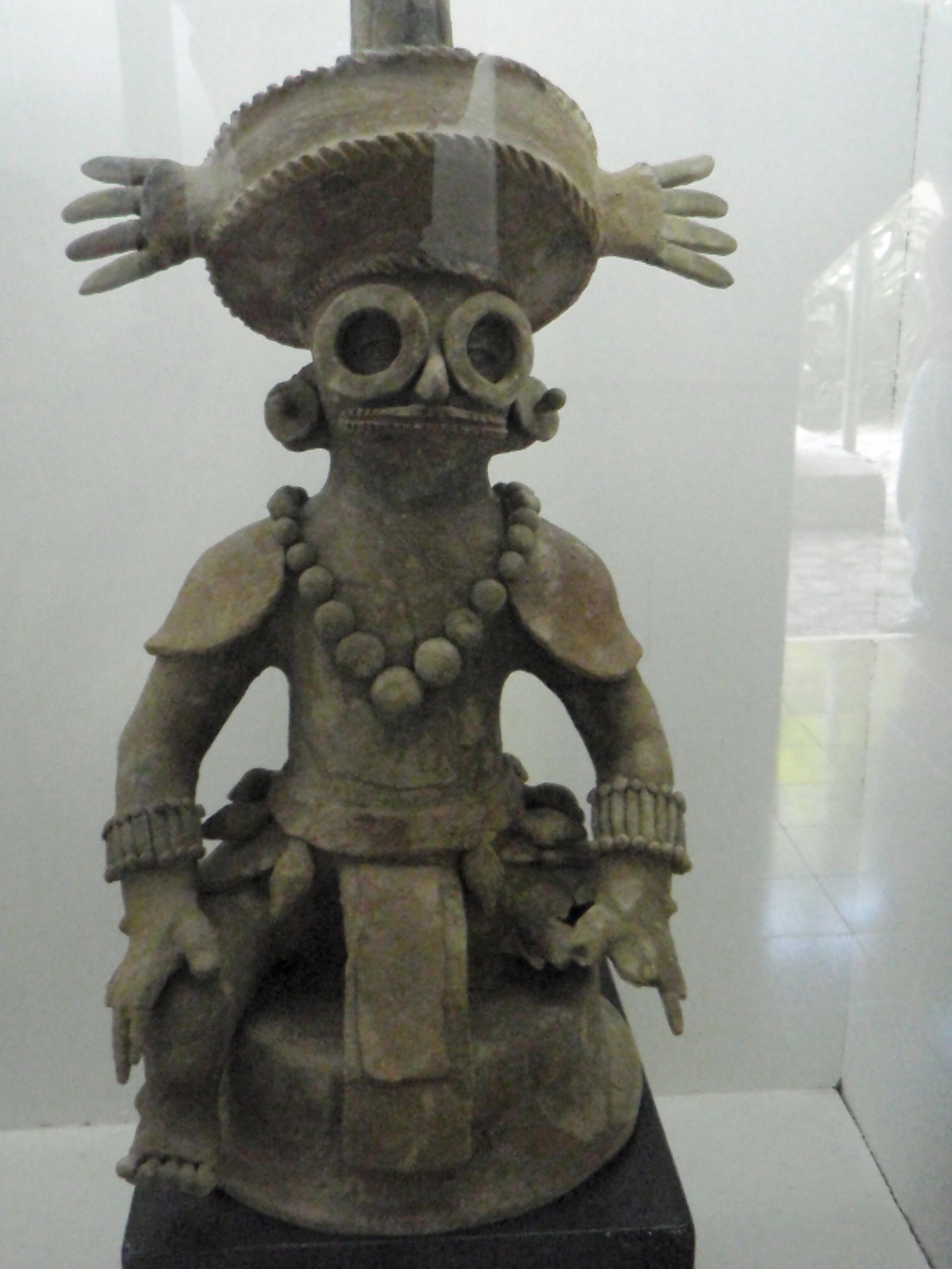 Incense burner from Classic Maya Period, around 7th century CE, found at the site of Copan and displayed at the Copan Ruinas town museum. It is believed to depict K'inich Yax K'uk' Mo', the founder of Copan's longest-run