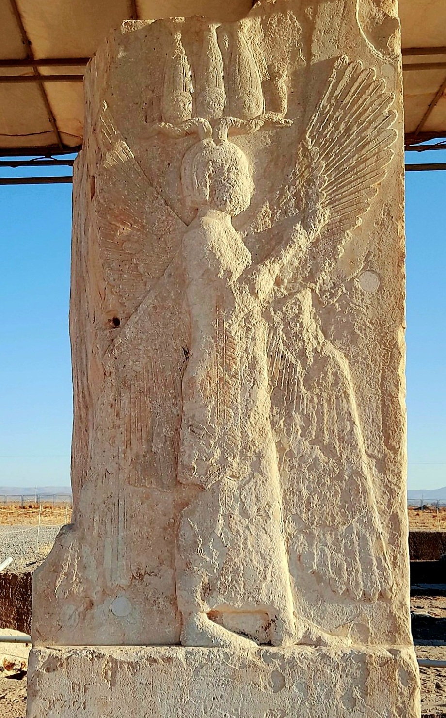 Winged genius relief in Pasargadae