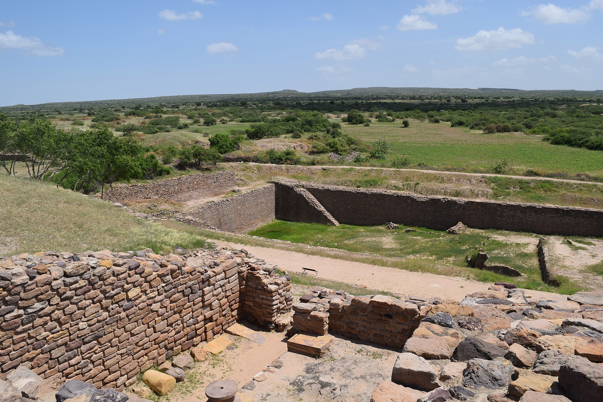 Dholavira in Gujarat, India, is one of the largest cities of Indus Valley Civilisation, with stepwell steps to reach the water level in artificially constructed reservoirs. 