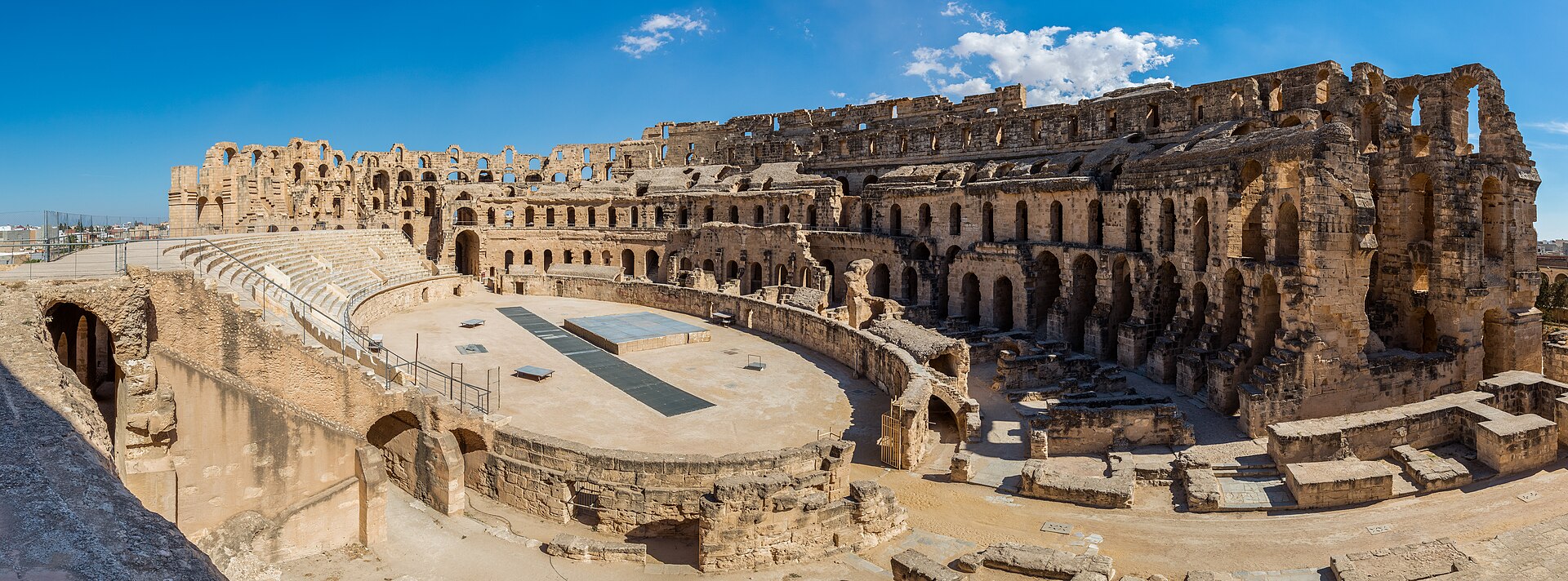 Panoramic view of the Amphitheatre of El Jem, an archeological site in the city of El Djem, Tunisia. The amphitheatre, a UNESCO World Her...