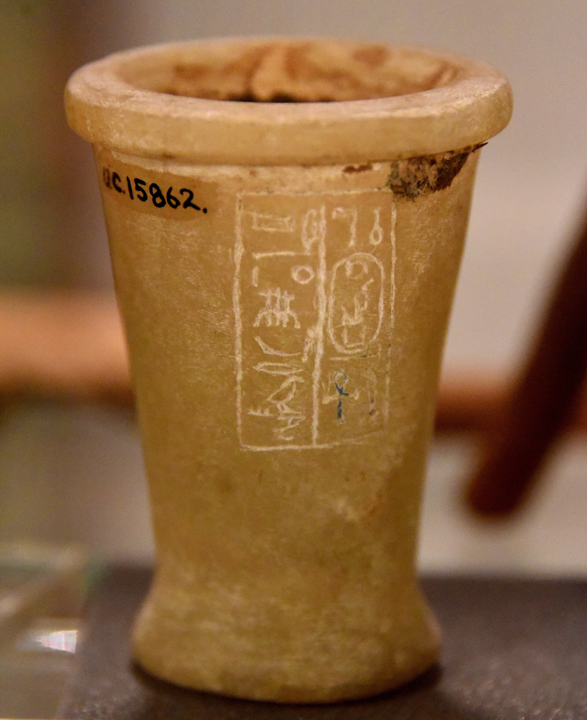 Jar bearing the cartouche of Hatshepsut. Filled in with cedar resin. Calcite, unfinished. Foundation deposit. 18th Dynasty. From Deir el-Bahari, Egypt. The Petrie Museum of Egyptian Archaeology, London. With thanks to th
