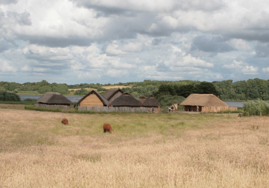 Seven reconstructed Viking houses in Haithabu. Outdoor area of the Viking Museum Haithabu.
