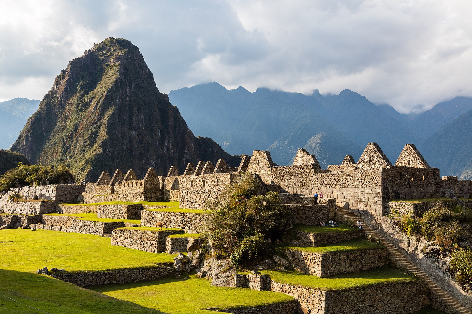 View of the ancient houses of Machu Picchu houses, Urubamba Province, Cusco Region, today Peru. The 15th-century Inca citadel, abandoned one century later, is situated in the Sacred Valley on a mountain ridge 2,430 metre