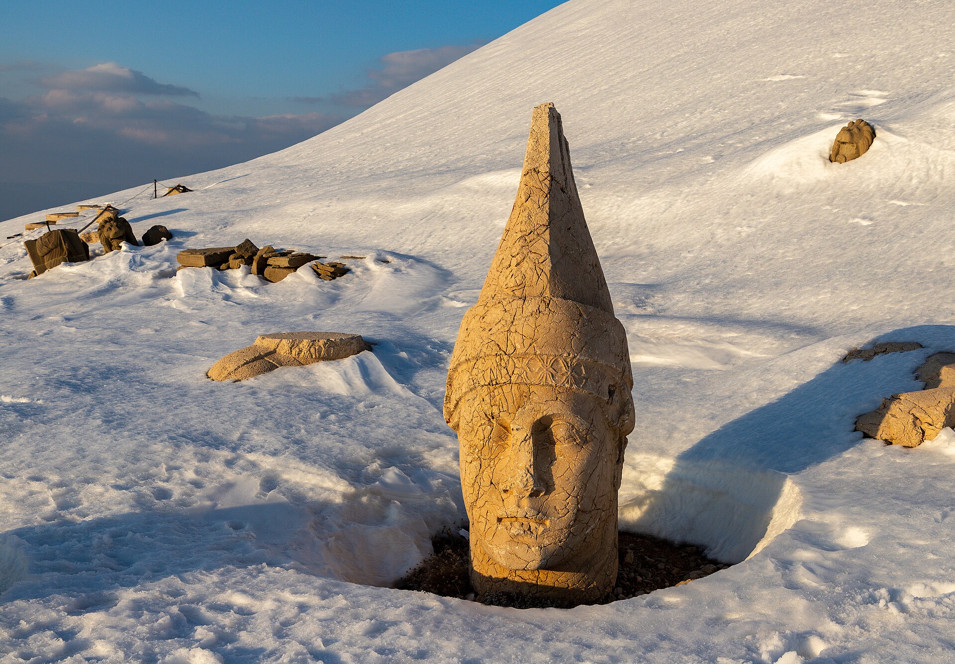 Some of the statues near the peak of Mount Nemrut (Turkey). West Terrace: head of Apollo and head of Goddess of Kommagene (Tyche). Scene ...
