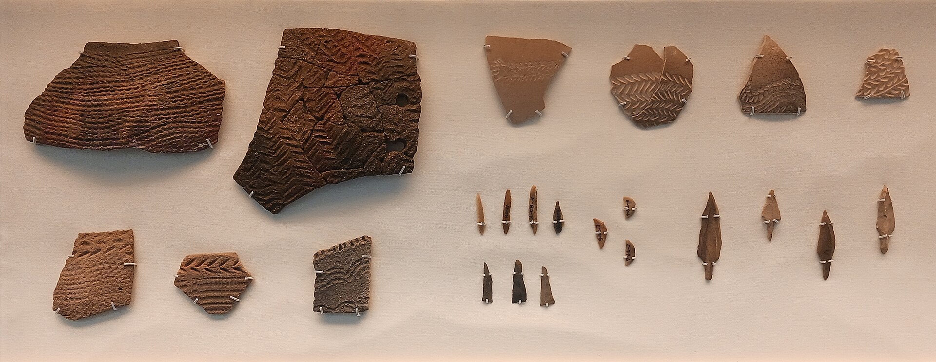 Nabta Playa artifacts (pottery, ostrich eggshells, flint implements, arrowheads). Early Neolithic (7050-6100 BCE). British Museum