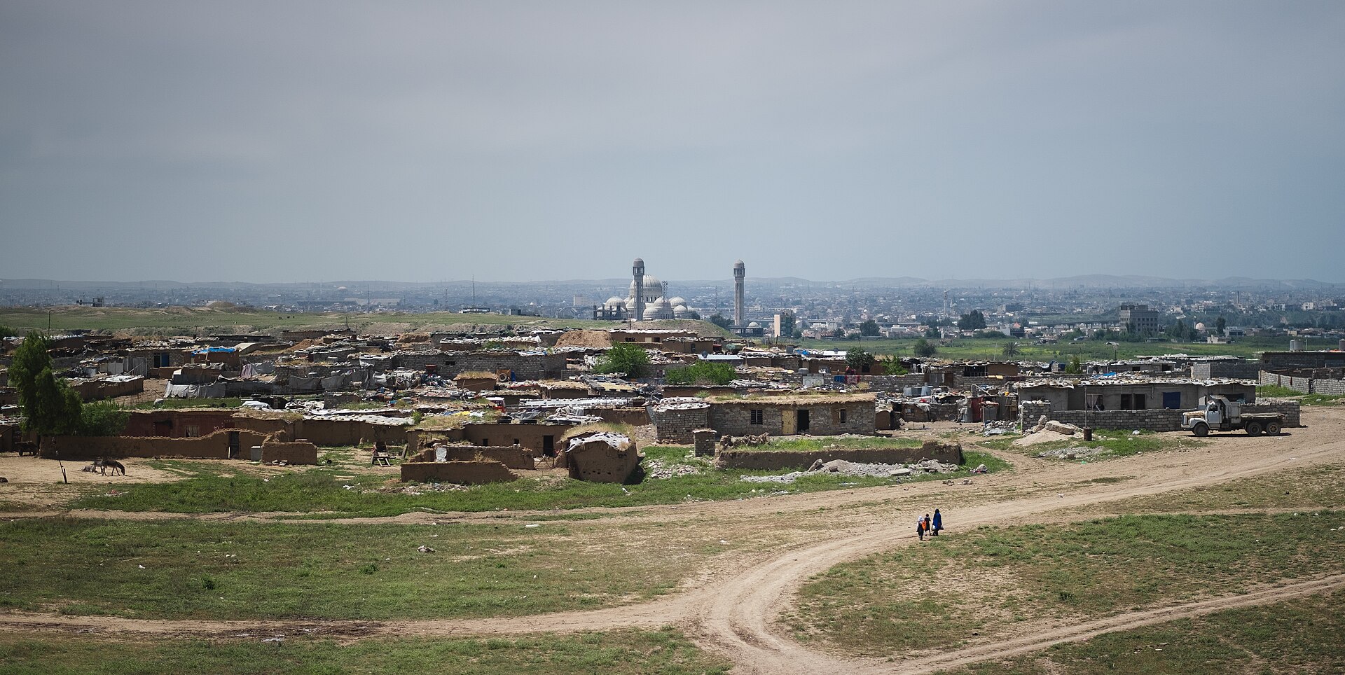 Views of the archaeological site of Nineveh in modern-day Mosul, currently occupied by squatters