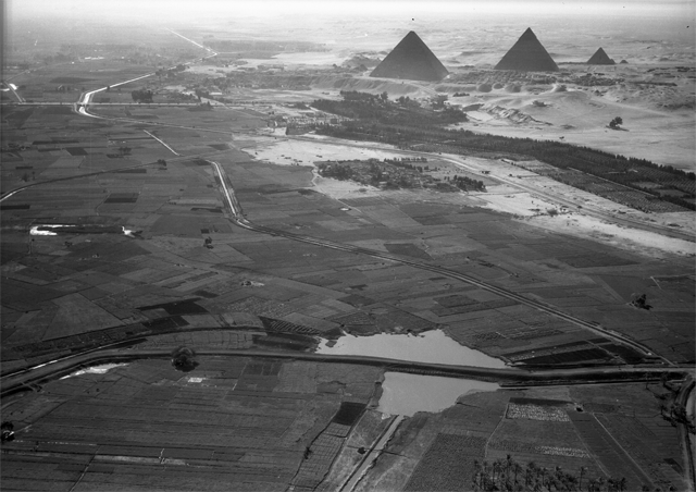 January 24, 1938. Cairo, Egypt: Another view of the pyramids and the border of the cultivated Nile valley. c. 1000 feet. 10:10.