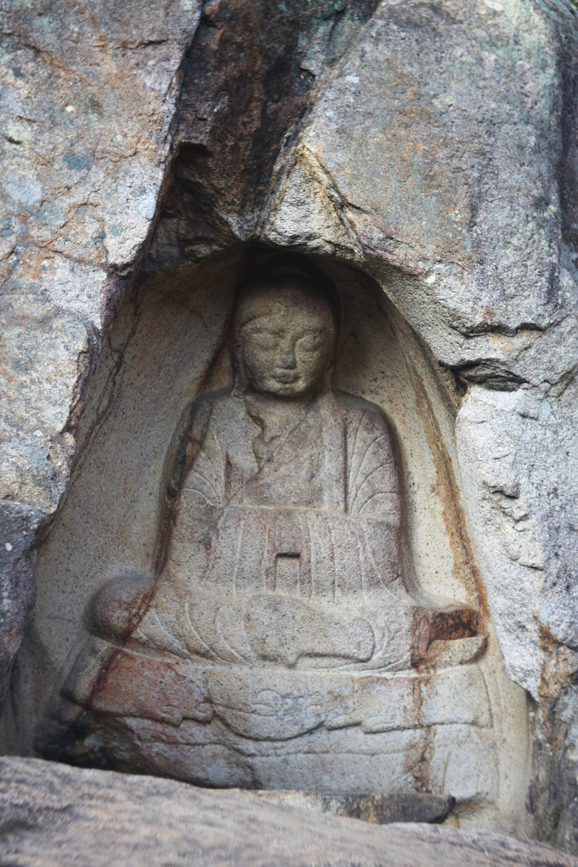 Rock-carved seated Buddha at Bulgok valley in Namsan, Gyeongju