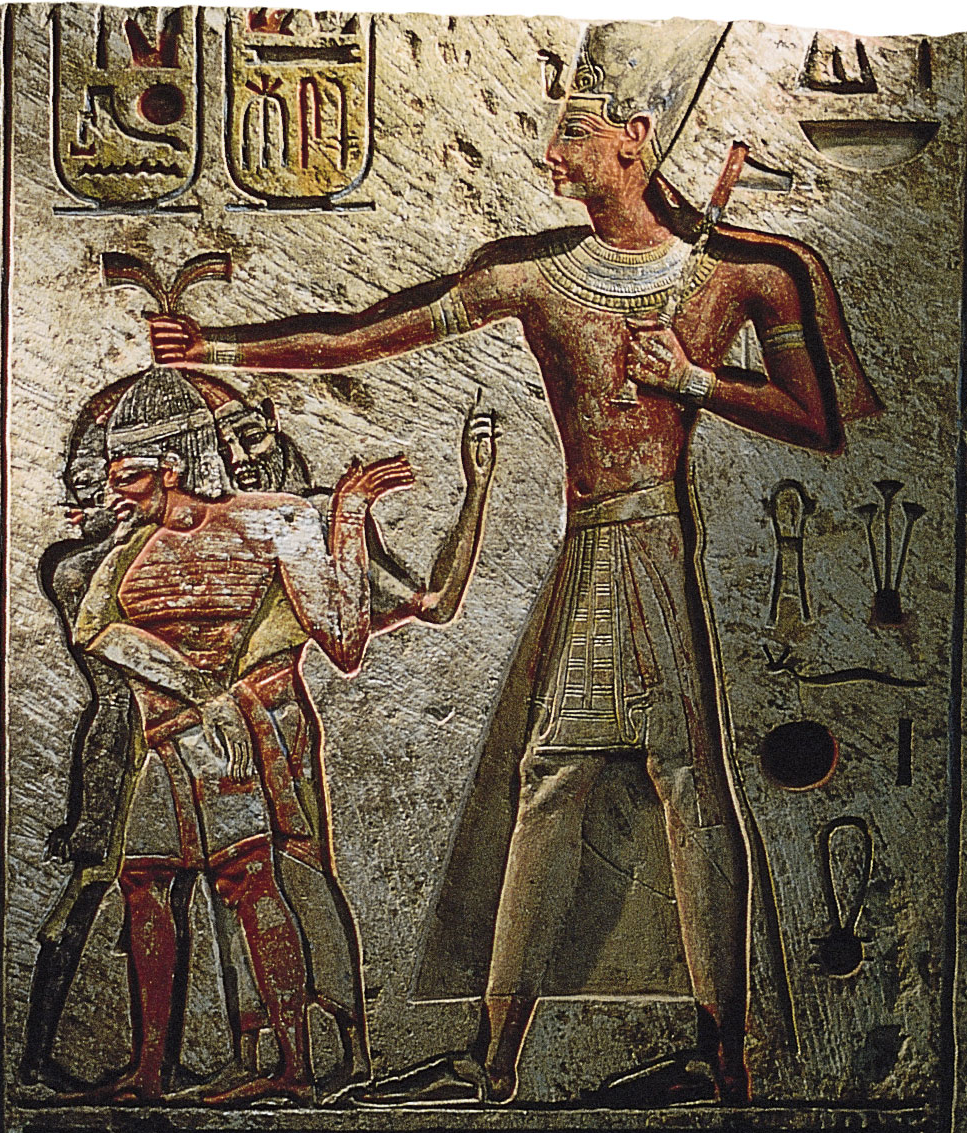 Ramses II taking a Nubian, a Syrian, and a Libyan prisoner. Created c. 1250 BCE, displayed in Cairo Museum.