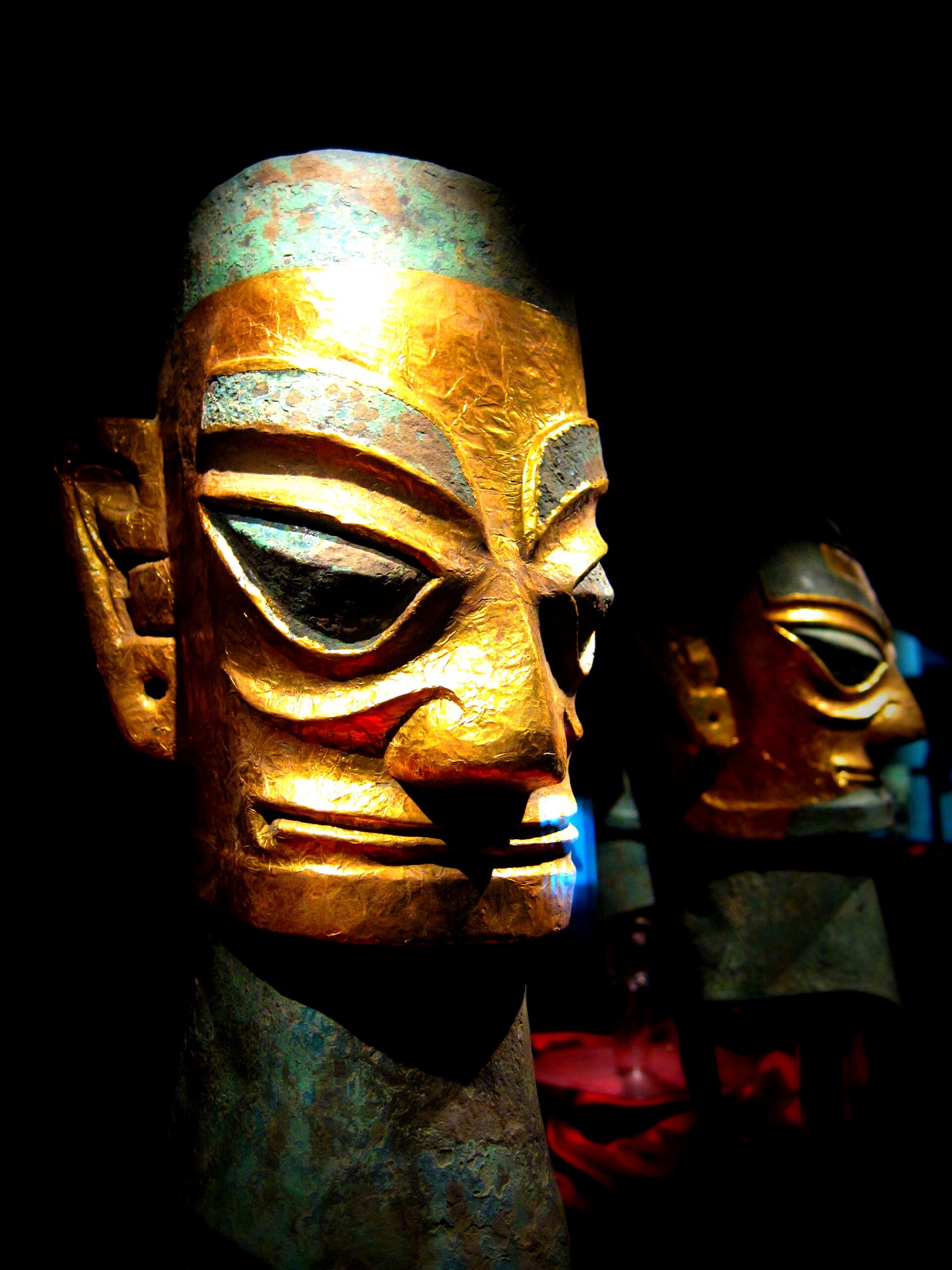 Sanxingdui bronze head wearing a gold foil mask.