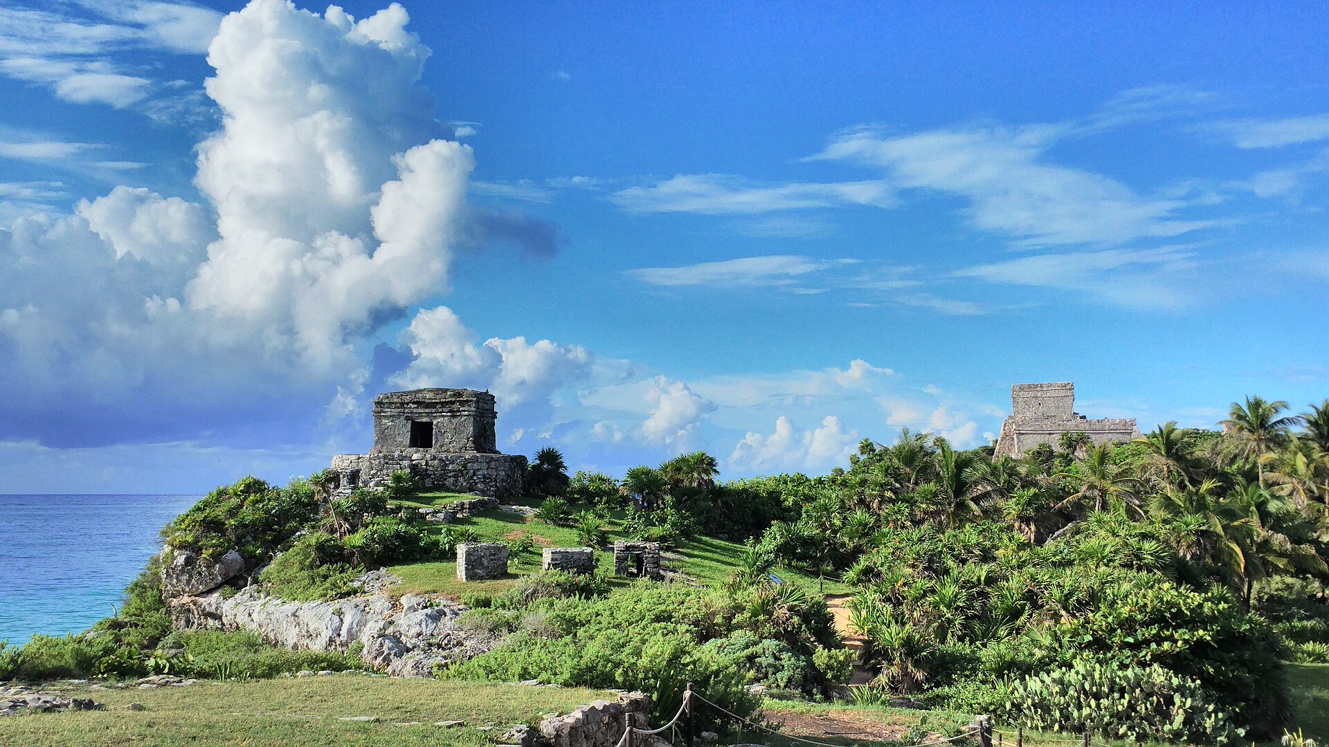 Tulum's Templo del Dios Viento (Temple of Wind God, left) and Castillo (castle, right)