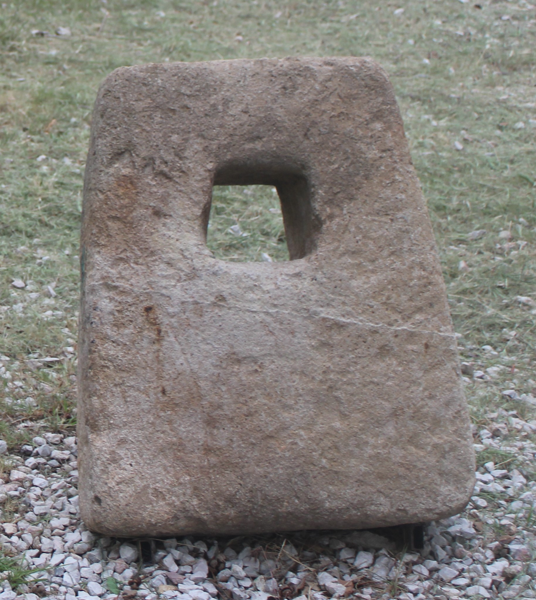 Weight anchor, beachrock, found in the Uluburun shipwreck, ca 1300 BC. Bodrum Museum of Underwater Archaeology KW 3330. Height 75.4 cm, max. width 61 cm, max. thickness 22 cm, weight 148.3 kg.